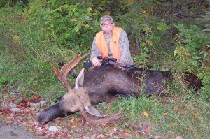 Hunter with Moose