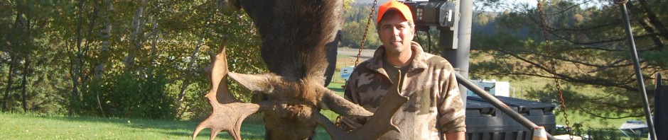 Kevin with Moose Hanging