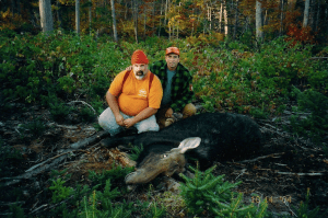 Man and Kevin with Moose